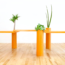 A Colorful Modular Table With Flower Pot Legs